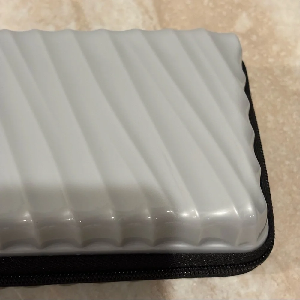 Tumi hard suitcase style cosmetic case